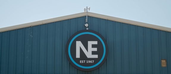 Newnham Precision Banner